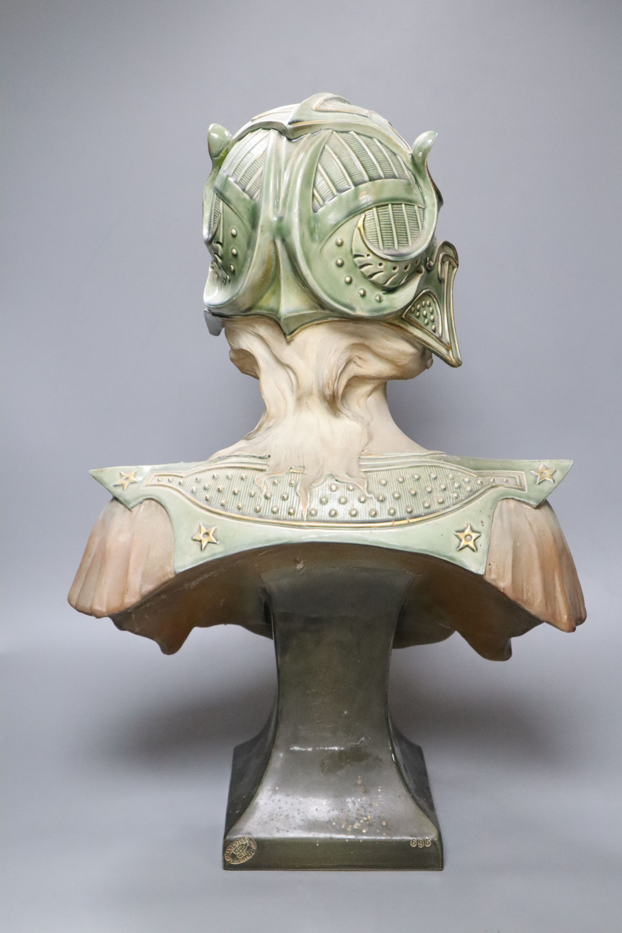 A pottery bust of a lady signed Jacobs, height 53cm